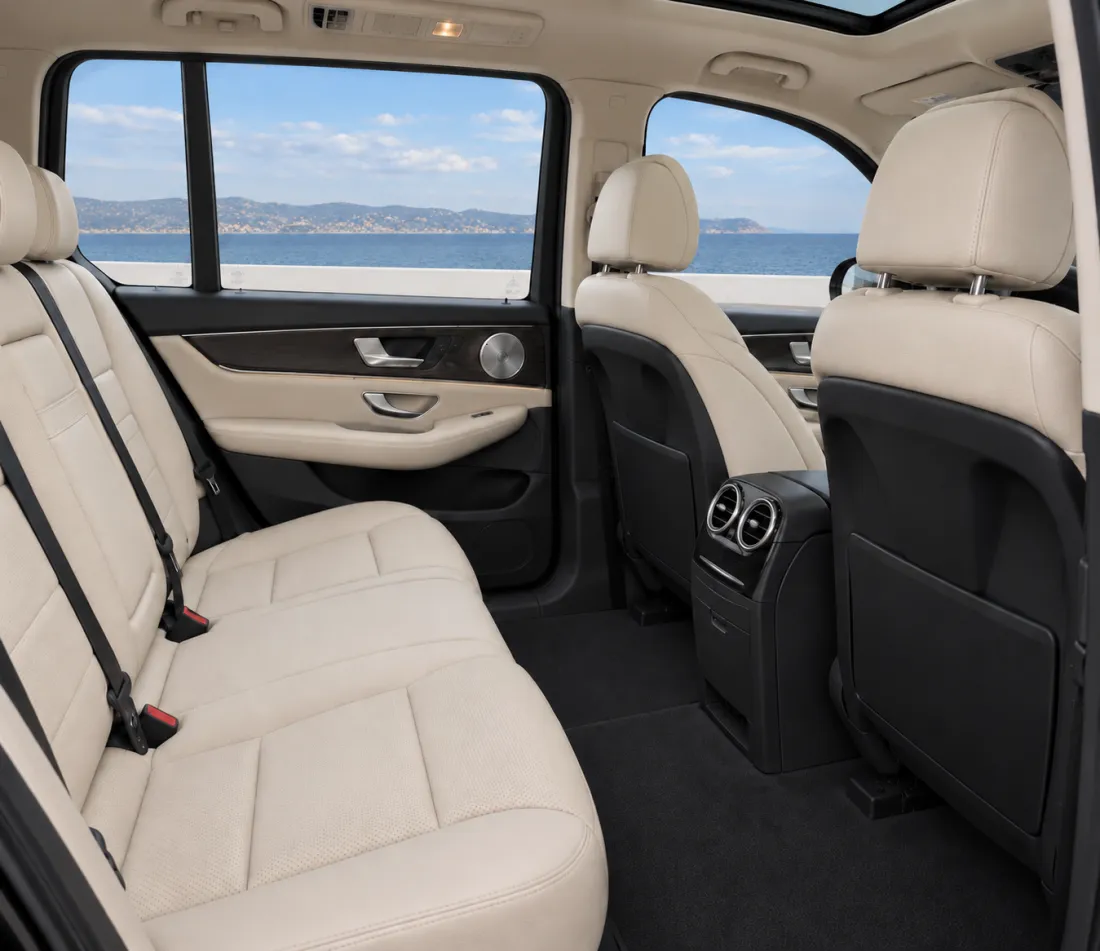Light leather rear passenger seats inside a Mercedes-Benz E-Class